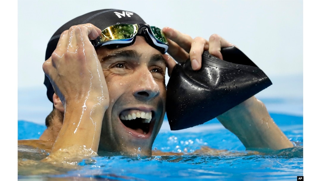United States' Michael Phelps reacts after the men's 100-meter butterfly final during the swimming competitions at the 2016 Summer Olympics, Friday, Aug. 12, 2016, in Rio de Janeiro, Brazil.