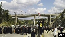 Žene su održale anti-vladine demonstracije u Baniasu, 13. aprila 2011.