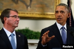 U.S. Defense Ash Carter, left, listens as President Barack Obama announces plans to slow the withdrawal of U.S. troops from Afghanistan in the Roosevelt Room at the White House, in Washington, Oct. 15, 2015.