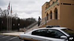 FILE - Members of the congregation arrive for Jum'a, the Friday prayer, at the All Dulles Area Muslim Society (ADAMS) Center in Sterling, Virginia.