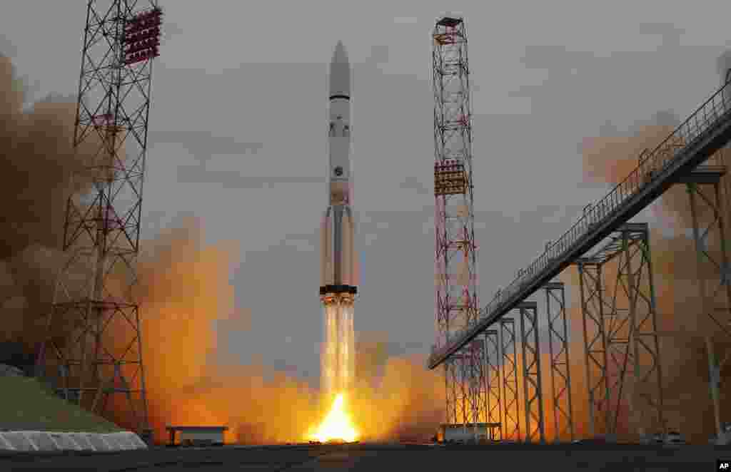 The Proton-M rocket booster blasts off at the Russian leased Baikonur Cosmodrome, Kazakhstan. Europe and Russia launched a joint mission Monday to explore the atmosphere of Mars and hunt for signs of life on the red planet. The unmanned ExoMars probe, a collaboration between the European Space Agency and Roscosmos, took off aboard a Russian rocket and is expected to reach Mars in October.