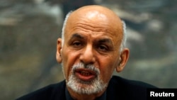 FILE - Afghanistan's President Ashraf Ghani speaks to the media during an event in Kabul, Dec. 10, 2014.