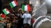 (FILE) In this Oct. 8, 2012 file photo, people ride on a float with a large bust of Christopher Columbus during the Columbus Day parade in New York.