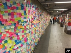 Anti-Trump Stickies posted Thursday at New York City rail station.