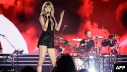 FILE - Singer-songwriter Taylor Swift performs her only full concert of 2016 during the Formula 1 United States Grand Prix at Circuit of The Americas on Oct. 22, 2016 in Austin, Texas.