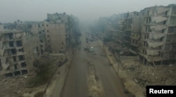 An image from video taken on Dec. 13, 2016 of a general view of bomb damaged eastern Aleppo, Syria in the rain