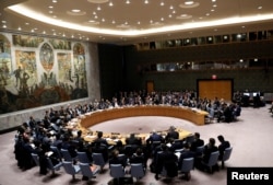 Members of the Security Council gather for a meeting on building regional partnership in Afghanistan and Central Asia at the United Nations in New York, Jan. 19, 2018.