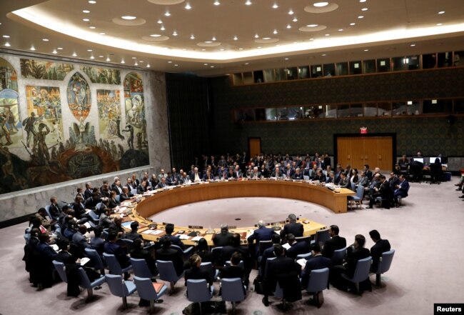 Members of the Security Council gather for a meeting on building regional partnership in Afghanistan and Central Asia at the United Nations in New York, Jan. 19, 2018.