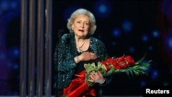 FILE - Actress Betty White accepts the favorite TV Icon award during the 2015 People's Choice Awards in Los Angeles, California, Jan. 7, 2015. 