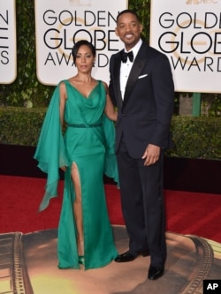 Jada Pinkett Smith and her husband, Will Smith, arrive at the 73rd annual Golden Globe Awards in Beverly Hills, Calif., Jan. 10, 2016. Pinkett Smith said she would boycott this year’s Oscars to protest the lack of diversity among nominees.