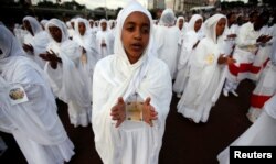 FILE - Sunday school children perform during the Meskel Festival to commemorate the discovery of the true cross on which Jesus Christ was crucified on at the Meskel Square in Ethiopia's capital Addis Ababa, Sept. 26, 2016.