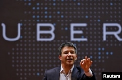 FILE - Travis Kalanick speaks to students during an interaction at the Indian Institute of Technology (IIT) campus in Mumbai, India, Jan. 19, 2016.