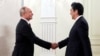 Putin, Abe Discuss Kuril Islands, WWII Treaty