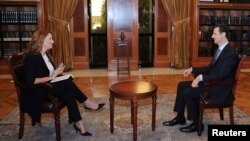 Presiden Suriah Bashar al-Assad saat diwawancarai oleh Televisi Italia 'RaiNews24' di Damaskus, 29 September 2013 (Foto: dok).