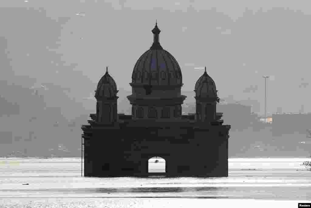 Apung mosque is seen sinking after the tsunami in Palu, Central Sulawesi, Indonesia.