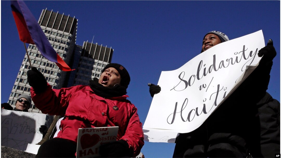 Haitian activists and immigrants protest on City Hall Plaza in Boston, Massachusetts, Jan. 26, 2018.