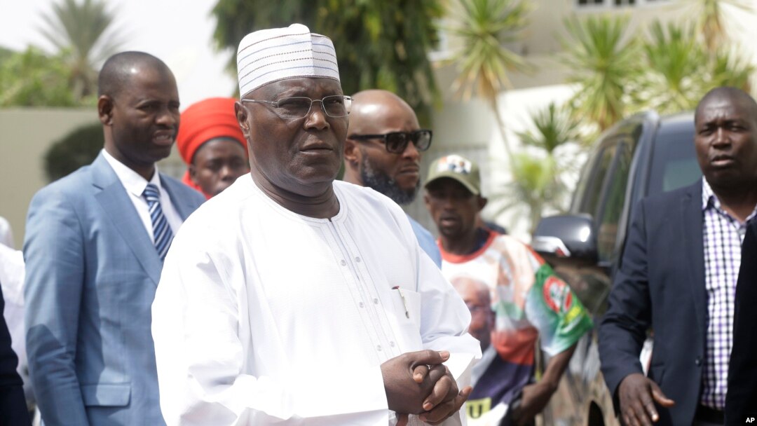 FILE - Nigerian presidential candidate Atiku Abubakar of the People's Democratic Party, speaks to journalists at his residence in Yola, Nigeria, Feb. 16, 2019.