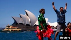 Representatives from South Pacific nations (L-R) Kaio Tiira Taula from Tuvalu, Seia Mikaele Maiava from Tokelau, Milan Loeak from the Marshall Islands and Raedena Solomona from Samoa, pose during an official launch of their campaign against the coal indus