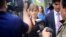 Actress Allison Mack (C) leaves after a hearing at Brooklyn Federal Court, May 4, 2018, in New York. 