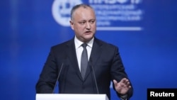 Moldovan President Igor Dodon delivers a speech during a session of the St. Petersburg International Economic Forum (SPIEF), Russia, June 2, 2017.