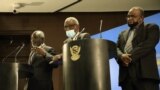 (L to R) Sudan Minister of Finance Gibril Ibrahim, Central Bank governor Mohamed al-Fatih and Minister of Trade Ali Geddo attend a press conference in Khartoum on Feb. 21, 2020.