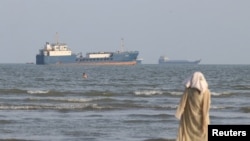 Vessels in the Strait of Hormuz near the beach of Bandar Abbas