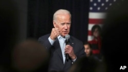  In this Monday, Dec. 30, 2019 file photo, Democratic presidential candidate former Vice President Joe Biden addresses a gathering during a campaign stop in Exeter, N.H.