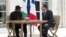 Nigerian President Goodluck Jonathan, left, met with French President Francois Hollande and other leaders for an African security summit in Paris on May 17, 2014. 