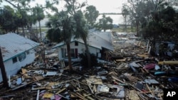 Destruction to the Faraway Inn Cottages and Motel is seen in the aftermath of Hurricane Helene in Cedar Key, Florida, Sept. 27, 2024.