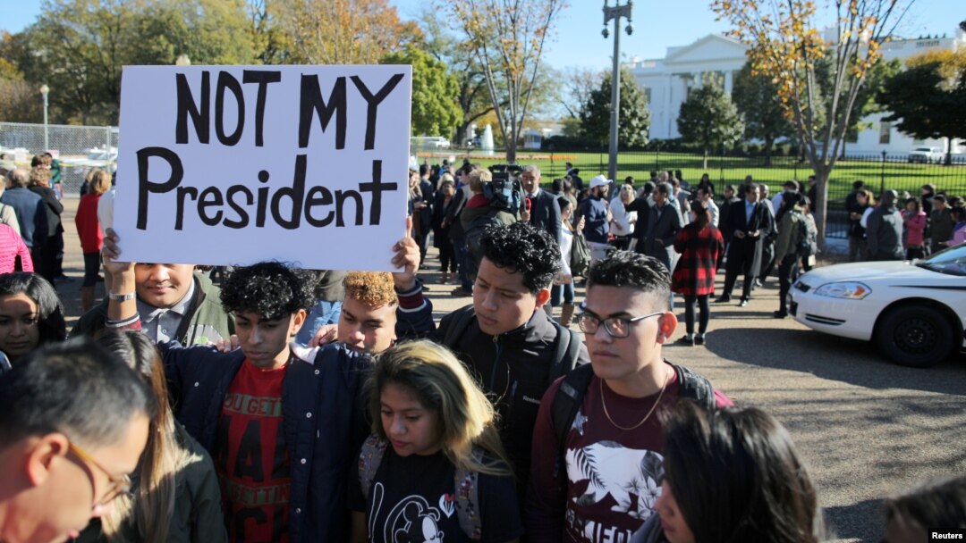 A group of protesters gather outside of the White House after U.S. President-elect Donald Trump met with U.S. President Barack Obama at White House in Washington, Nov. 10, 2016.