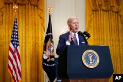 President Joe Biden participates in a virtual event with the Munich Security Conference in the East Room of the White House, Feb. 19, 2021.