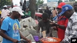 Five goats were slaughtered for a feast on the streets in Goma, the capital of the troubled North Kivu province in DRC in honor of the re-election of President Joseph Kabila.