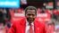 In this April 5, 2019, file photo, former St. Louis Cardinals great Lou Brock rides around the warning track prior to the Cardinals home opener baseball game against the San Diego Padres in St. Louis.