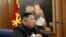 North Korean leader Kim Jong Un speaks during the Third Enlarged Meeting of the Seventh Central Military Commission of the Workers' Party of Korea in this undated photo released Dec. 22, 2019, by North Korea's Korean Central News Agency.