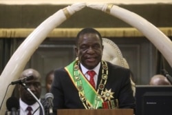 FILE - Zimbabwean President Emmerson Mnangagwa delivers his State of the nation address at the opening session of parliament in Harare.