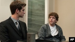 Andrew Garfield, left, and Jesse Eisenberg in Columbia Pictures' "The Social Network."