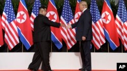 AQSh va Shimoliy Koreya rahbarlari Donald Tramp va Kim Chen Un, Singapur, 12-iyun, 2018