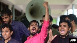 Bangladeshi students of Dhaka University take part in a protest in Dhaka, Oct. 7, 2019. 