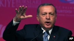 Turkey's President Recep Tayyip Erdogan speaks during a graduation ceremony for foreign students in Ankara, June 11, 2015.