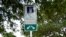 A parking area with charging stations for electric vehicles at a public park is seen April 1, 2021, in Orlando, Fla.