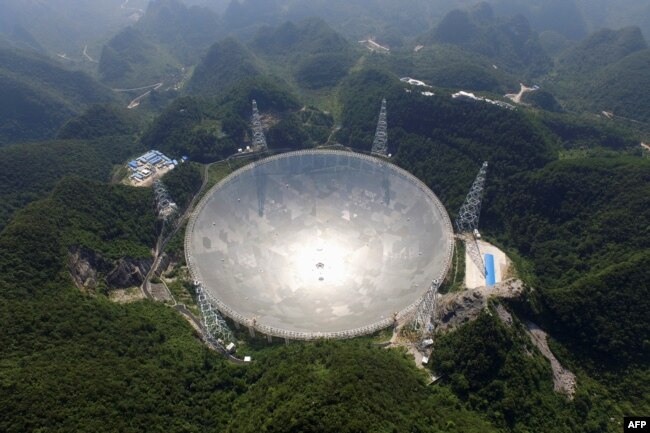 This handout photo taken Aug. 24, 2016 and released Dec. 13, 2020, by the National Astronomical Observatories of the Chinese Academy of Sciences (NAOC) shows the 500-meter Aperture Spherical Radio Telescope (FAST) in China's Guizhou province.