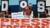 Protesters rally outside the armed forces headquarters to mark World Press Freedom Day which was declared by the UN General Assembly in 1993, May 3, 2019, in Manila, Philippines. 