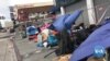 Volunteers Bring Holiday Cheer to the Homeless
