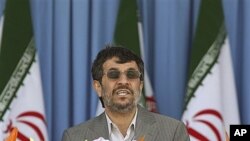 Iranian President Mahmoud Ahmadinejad delivers his speech, during army parade, marking national Army Day in front of the mausoleum of the late revolutionary founder Ayatollah Khomeini near Tehran, Iran, Monday, April 18, 2011