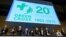 Participants applaud on September 2, 2013, in Geneva during the opening of a conference to celebrate the 20th anniversary of Green Cross International.