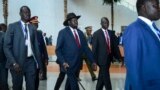 FILE - South Sudan's President Salva Kiir, center, arrives for an African Union summit in Addis Ababa, Ethiopia, Feb. 9, 2020. Speaking Feb. 14 in Juba, Kiir accused summit envoys of trying to prolong South Sudan's dispute over its number of states.