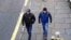 A handout picture taken in Salisbury on March 4, 2018, and released by the British Metropolitan Police Service in London on September 5, 2018, shows Alexander Petrov (R) and Ruslan Boshirov, who are wanted by British police.