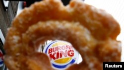 Logo Burger King dalam foto ilustrasi di Toronto, Kanada, 29 Agustus 2014. (Foto:dok)