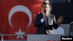 Istanbul Mayor Ekrem Imamoglu from the main opposition Republican People's Party (CHP), speaks during a rally to protest against the arrest of Esenyurt Mayor Ahmet Ozer, in Istanbul, Turkey, Oct. 31, 2024.