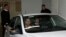 Melvin Theuma, who allegedly acted as a middleman in a plot to murder of journalist Daphne Caruana Galizia, is seen in a police car as he leaves the Courts of Justice in Valletta, Malta, Dec. 4, 2019. 